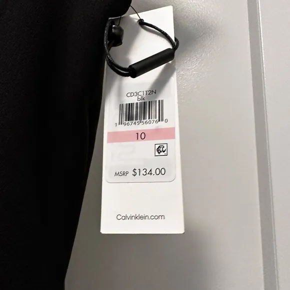 NWT! Black CALVIN KLEIN Scuba Dress with Flutter Hem and Button Details- Size 10